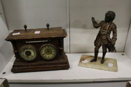 A combination clock, barometer and thermometer together with a cast metal figure of a musician.