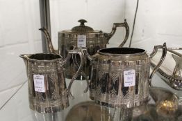 A plated three piece tea service.