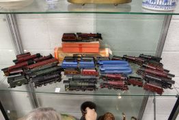 A collection of Hornby double OO gauge trains and carriages.