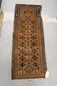 A small Persian prayer rug / runner.