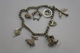 A small silver charm bracelet.