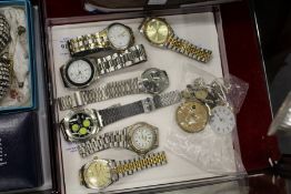 Various watches and watch parts.