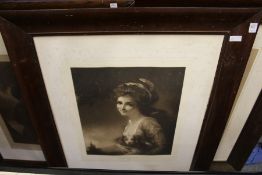 A set of three large portrait engravings in moulded wood frames.