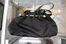 A Lulu Guinness brushed satin material handbag.