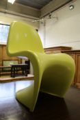 In the manner of Verner Panton, a moulded fibreglass chair.