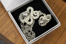 A small box of costume jewellery.