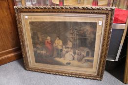 'Selling Rabbits' colour print in a decorative gilt frame.