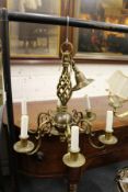 A Dutch style brass six branch chandelier.