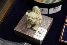 A Chinese carved soapstone lion dog seal.