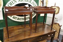 A pair of mahogany tray tables.