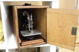 A Willcox & Gibbs cased sewing machine.