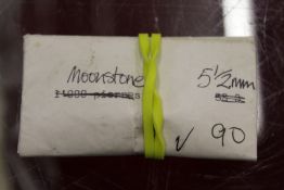 A small group of loose moonstones.