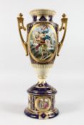 A Vienna porcelain two-handled urn shaped vase on stand (AF).