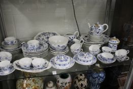 A large quantity of Meissen onion pattern style porcelain.