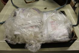 A quantity of white lace linen etc.