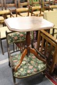 A mahogany tripod table.