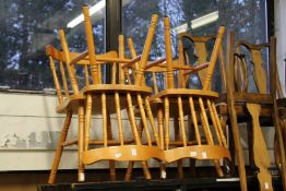 A set of four kitchen chairs.