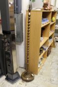 An oak barley twist standard lamp.