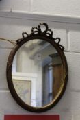 An oval mirror.