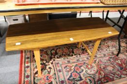A 1970's teak coffee table.