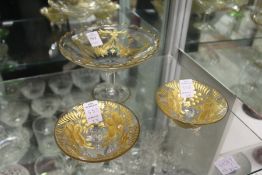 A gilt decorated cut glass sweetmeat dish and pair of similar dishes.
