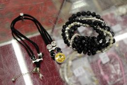 Two decorative bracelets.