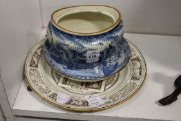 A blue and white decorated sucrier (lacking cover), a similar dish and a Wedgwood plate.