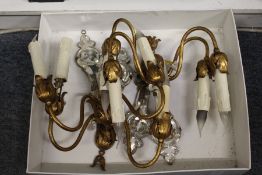 A set of four ormolu and cut glass wall appliques.