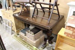 A refectory style oak draw leaf dining table.