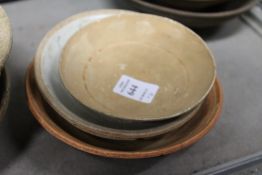 Four Chinese pottery bowls.