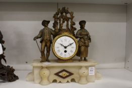 A French gilt metal and alabaster mantle clock.