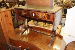 A miniature sofa table.