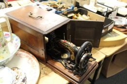 A cased Singer sewing machine.