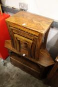 A modern nest of tables and matching corner TV stand.