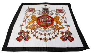 A ladies' silk head scarf.