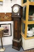 An oak cased grandmother clock.