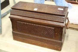 A cased sewing machine.