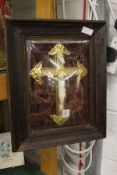 A framed and glazed crucifix.