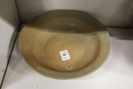 A Chinese pottery bowl.