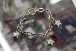 A silver bracelet.
