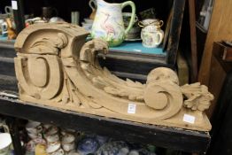A carved pine wall bracket.