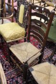 A 19th century ash ladder back armchair.