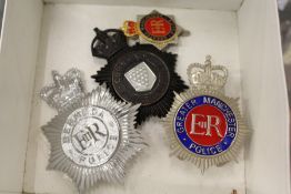 Police badges.