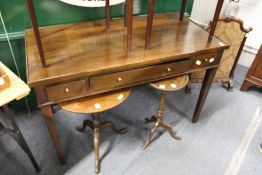 A modern hardwood three drawer side table.