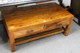 A modern hardwood coffee table.