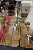A brass twin branch wall light.
