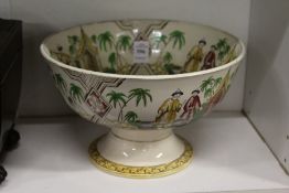 A Staffordshire pottery circular bowl decorated in the Chinese taste.
