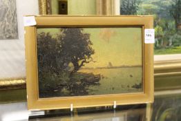 A small oil painting, a lake scene with trees and a boat.