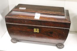 A Regency rosewood tea caddy.