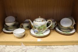 A Japanese egg shell tea service.